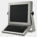 IP65/IP66 Full-Travel Monitor-Mounted Keyboard with Button Pointer, mounted on Universal Mount Monitor