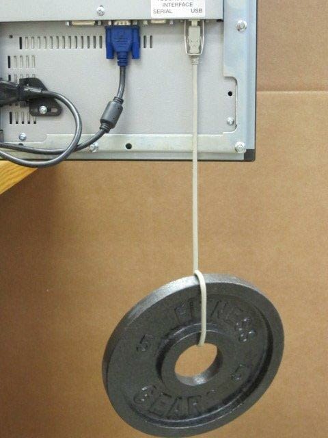 Showing the strength of our USB cable retention bracket with a 5 pound weight